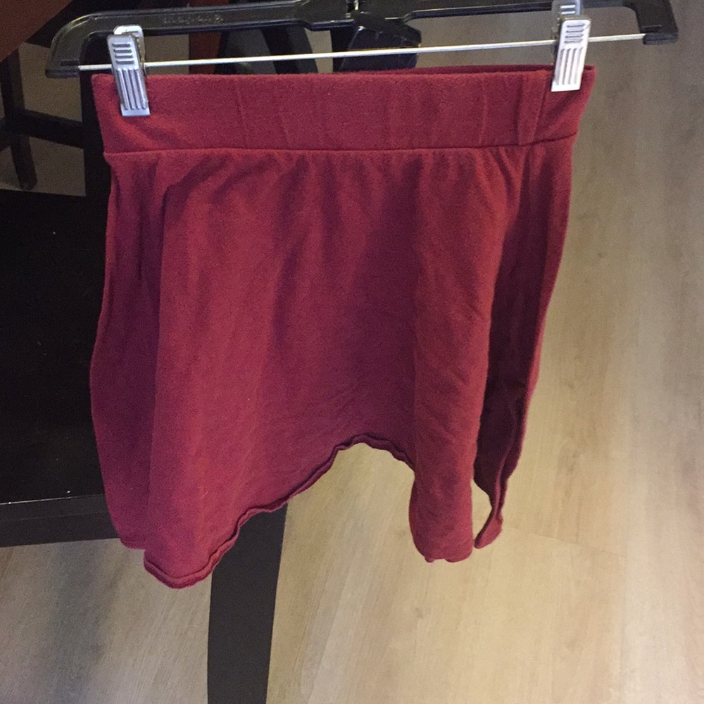 Maroon/ red skirt.